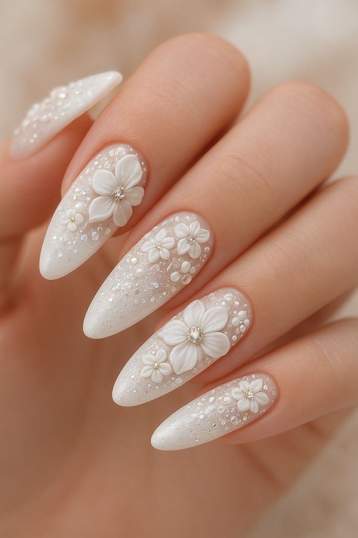 Milky white almond nails with 3D white flowers