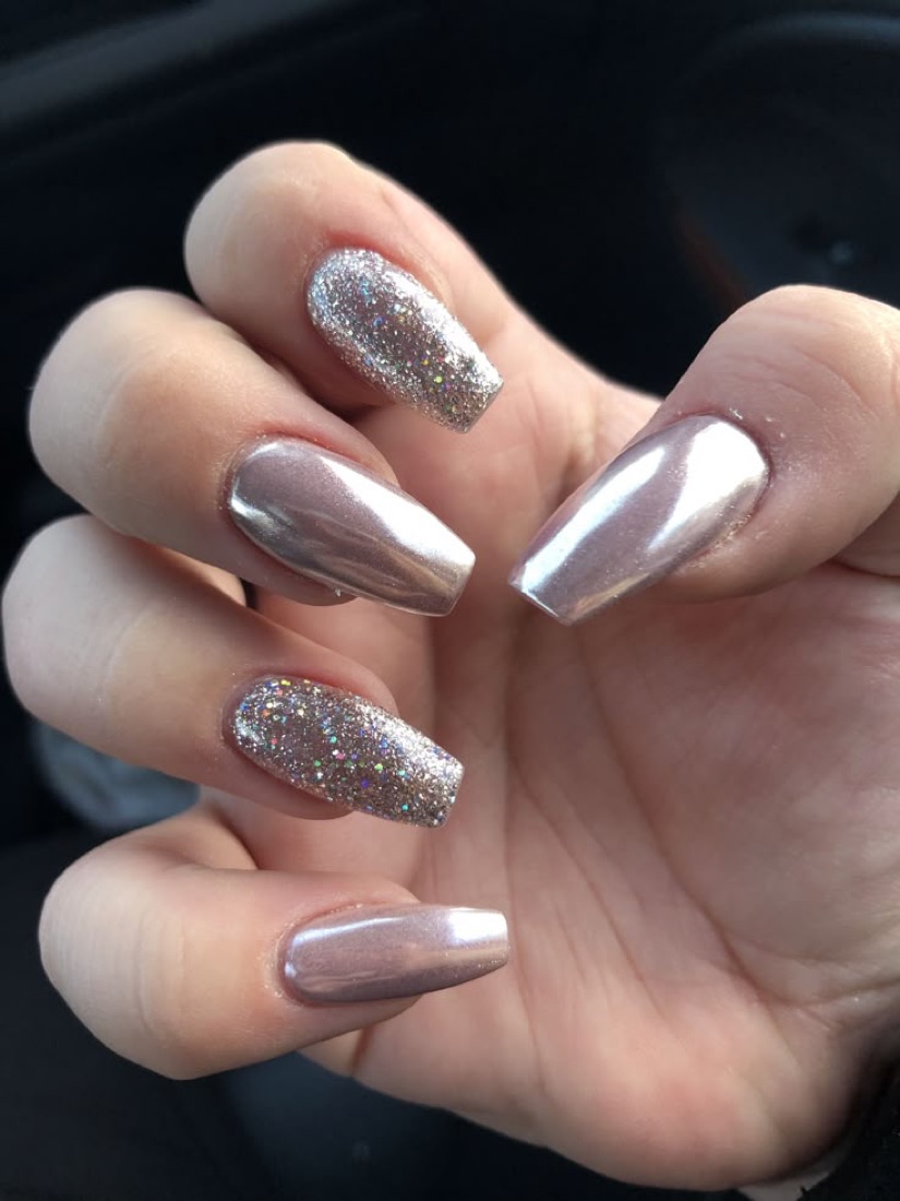 Silver chrome nails with glitter accents